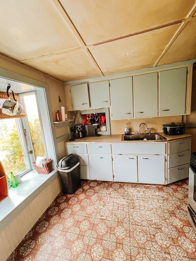 kitchen with stove and sink