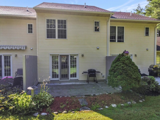 back of house with a patio