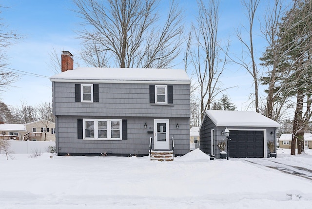 front of property with a garage