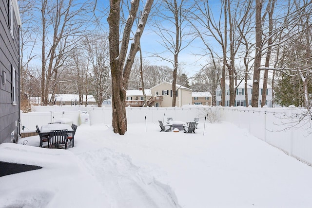 view of yard covered in snow