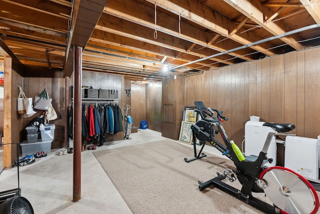 workout room with wooden walls