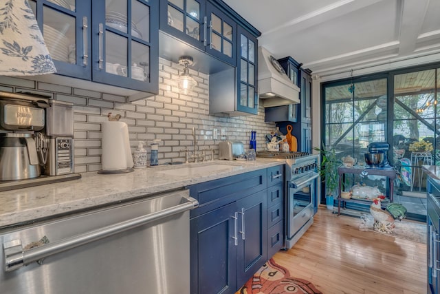 54 Webhannet Dr, Wells, ME 04090 - kitchen featuring appliances with stainless steel finishes, blue cabinets, and a sink