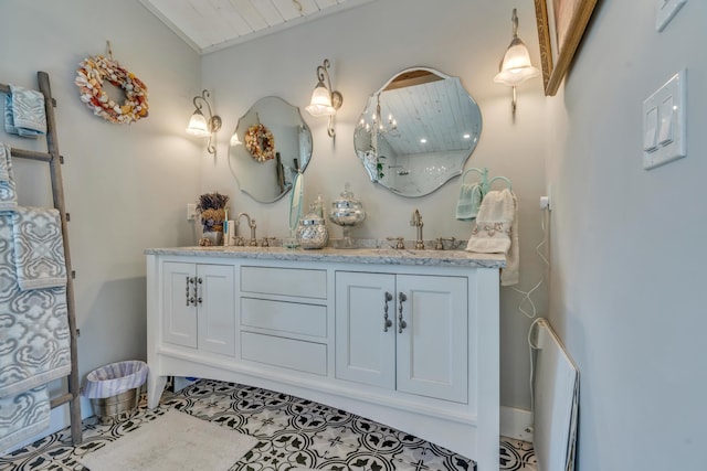 54 Webhannet Dr, Wells, ME 04090 - full bath featuring double vanity and tile patterned flooring