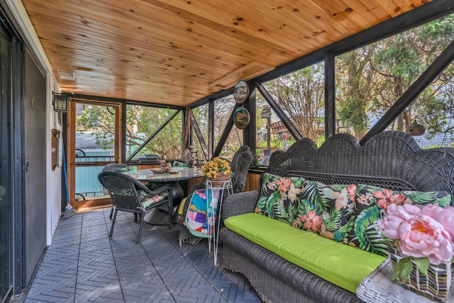 54 Webhannet Dr, Wells, ME 04090 - sunroom / solarium featuring outdoor dining area