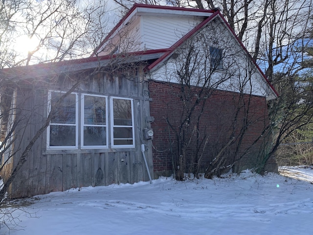 view of snow covered property