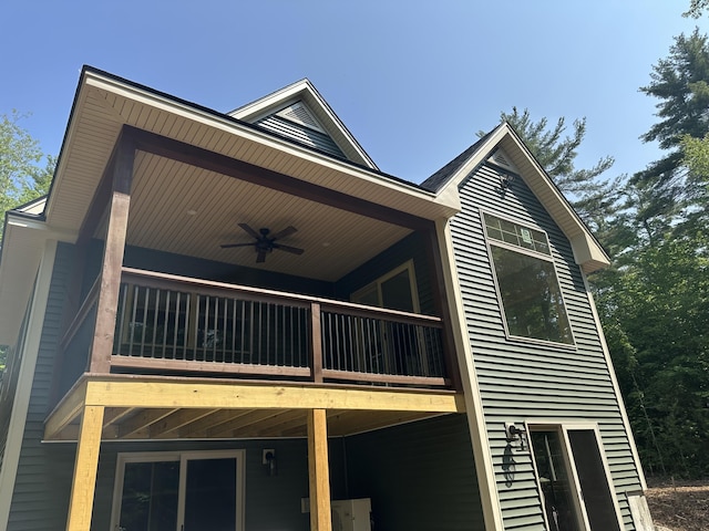 15 Rileys Run, Bridgton, ME 04009 - view of side of home featuring a ceiling fan and a deck