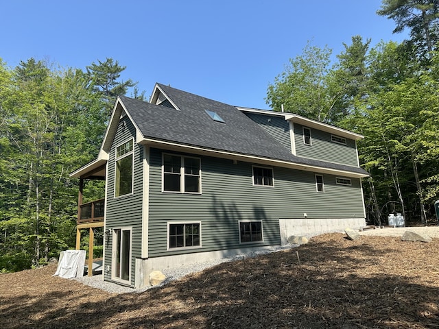 15 Rileys Run, Bridgton, ME 04009 - view of side of property featuring a shingled roof