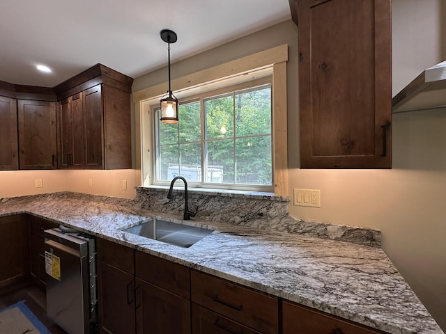 15 Rileys Run, Bridgton, ME 04009 - kitchen with a sink, light stone counters, dark brown cabinets, pendant lighting, and stainless steel dishwasher