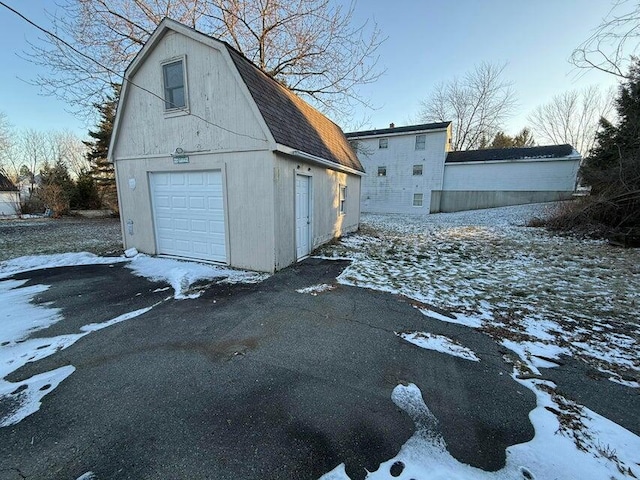 view of snow covered garage