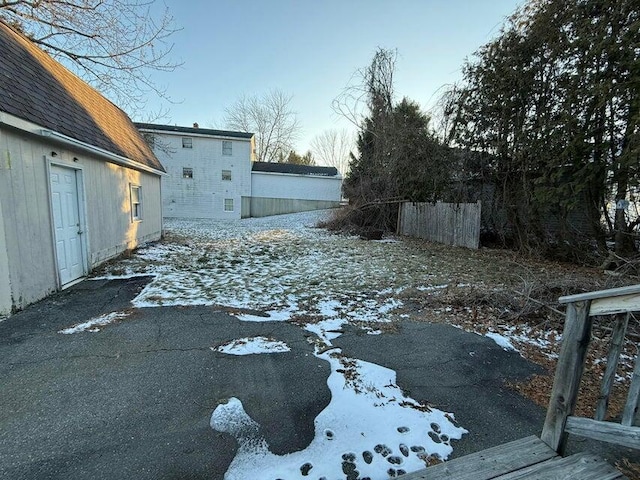 view of yard covered in snow