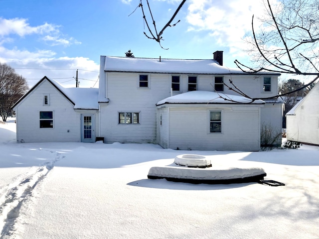 view of snow covered property