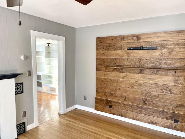 unfurnished room with hardwood / wood-style floors