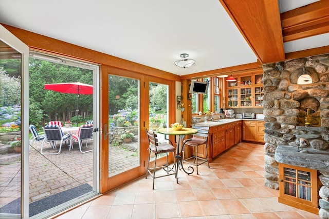 kitchen featuring sink and light tile patterned floors