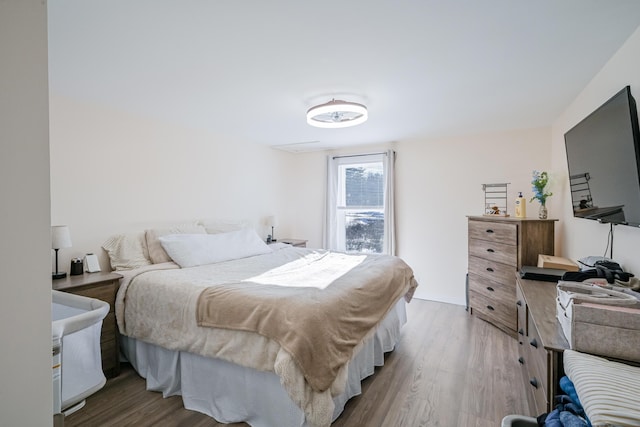 bedroom featuring wood-type flooring