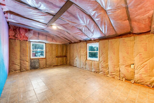 below grade area with tile patterned floors