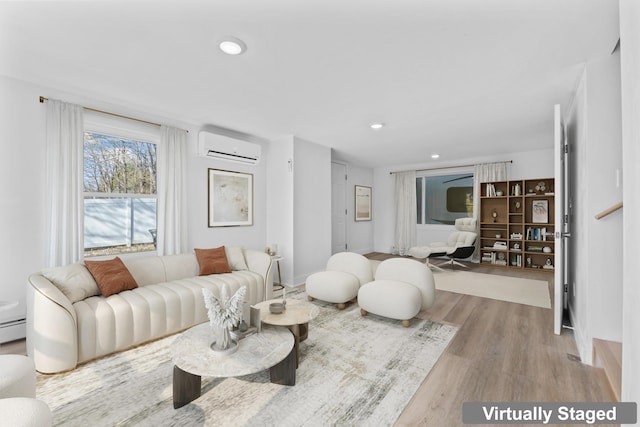 living area featuring recessed lighting, a wall unit AC, wood finished floors, and a baseboard radiator