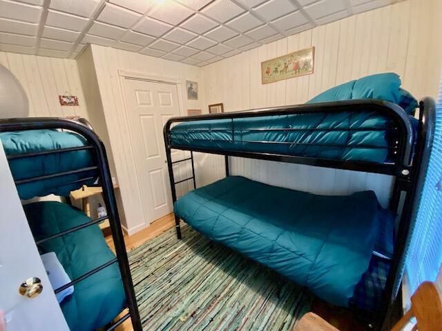 bedroom featuring wood-type flooring