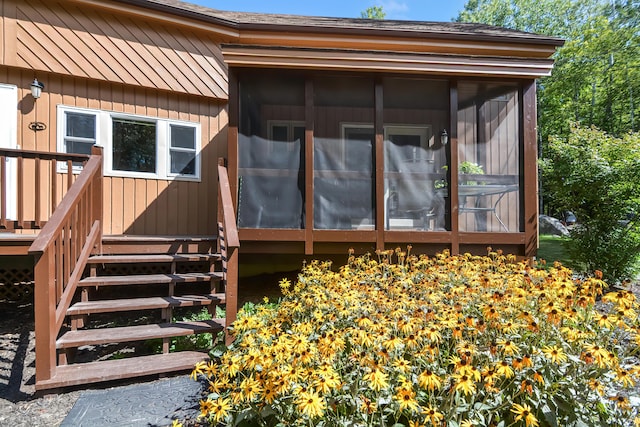 exterior space featuring a sunroom