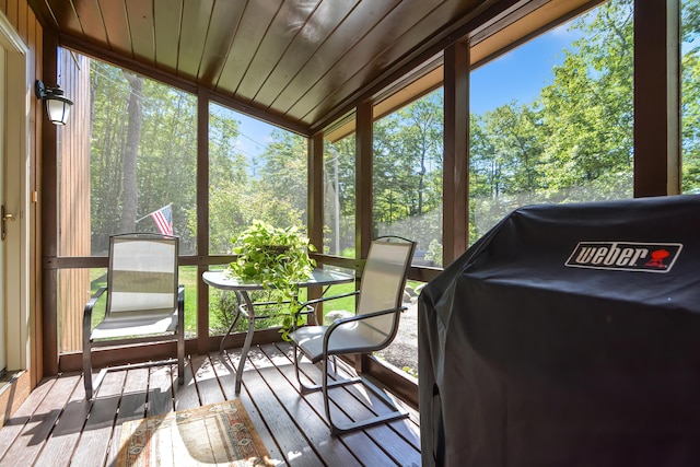 sunroom with wood ceiling