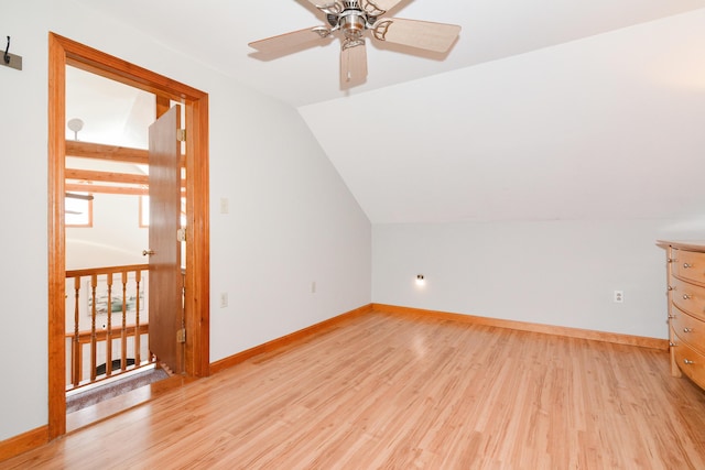 bonus room featuring ceiling fan, lofted ceiling, and light wood-type flooring