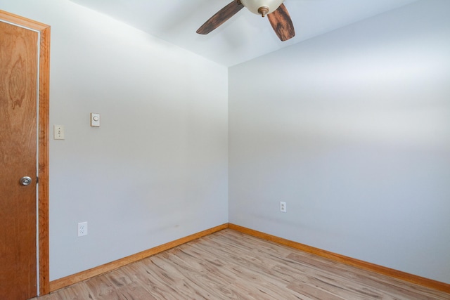 spare room with light hardwood / wood-style floors and ceiling fan