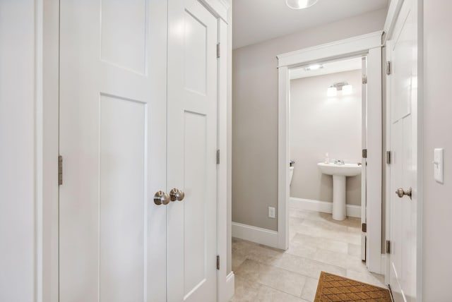 bathroom featuring tile patterned flooring