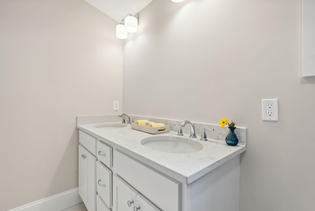 bathroom with vanity and tile patterned flooring