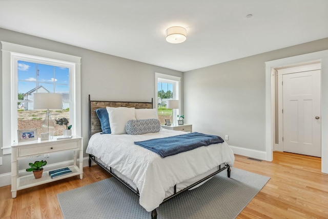 bedroom featuring hardwood / wood-style flooring