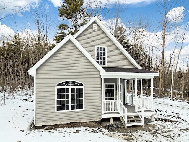 view of snow covered house