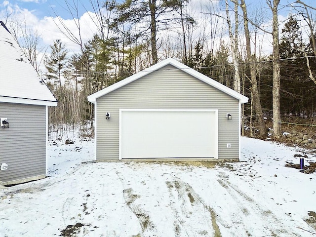 view of snow covered garage