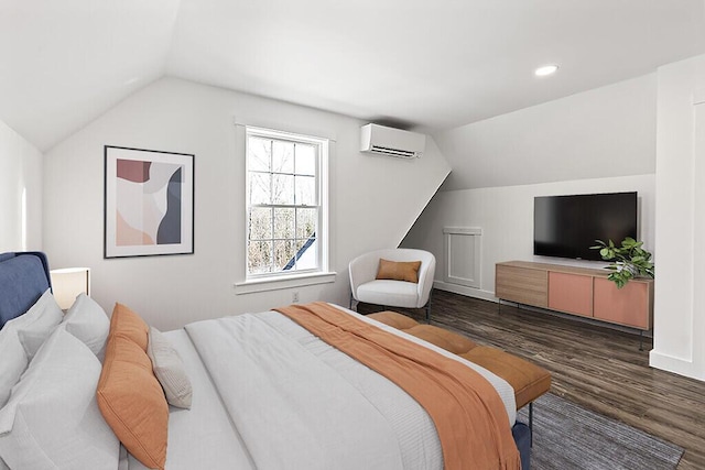 bedroom featuring lofted ceiling, dark hardwood / wood-style floors, and a wall mounted AC