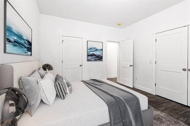 bedroom featuring dark wood-type flooring