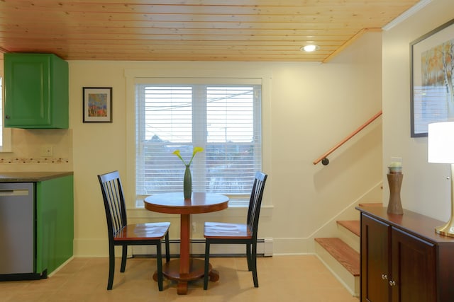 tiled dining area featuring wooden ceiling