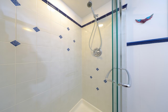 bathroom featuring an enclosed shower