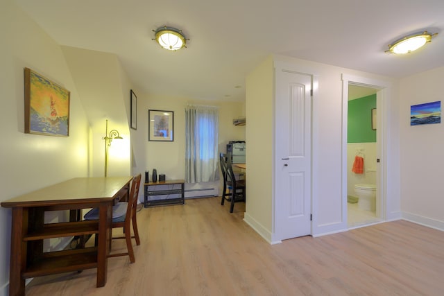 hallway featuring a baseboard radiator and light wood-type flooring