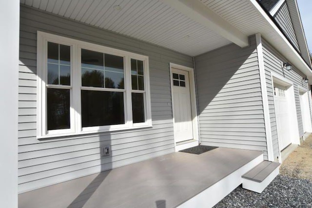 doorway to property featuring a garage