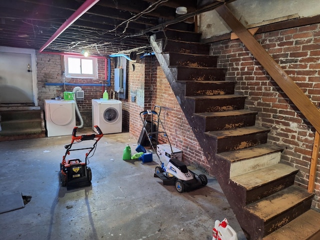 basement with washer and clothes dryer