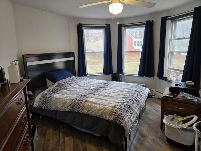 36 Erchles St, Rumford, ME 04276 - bedroom featuring a baseboard radiator, dark wood-style flooring, and ceiling fan
