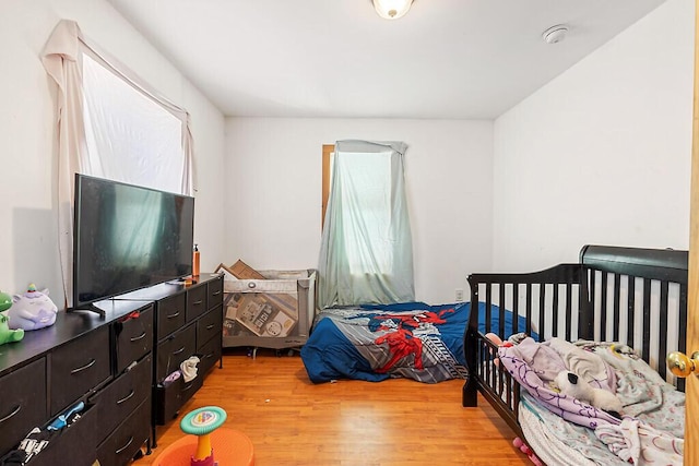 bedroom featuring light hardwood / wood-style floors