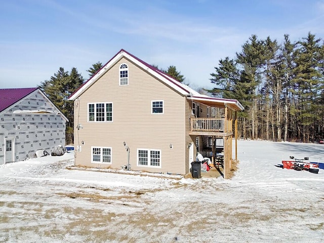 view of snow covered house