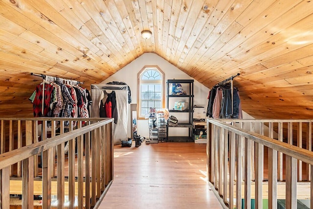 interior space with hardwood / wood-style flooring, wood ceiling, and lofted ceiling