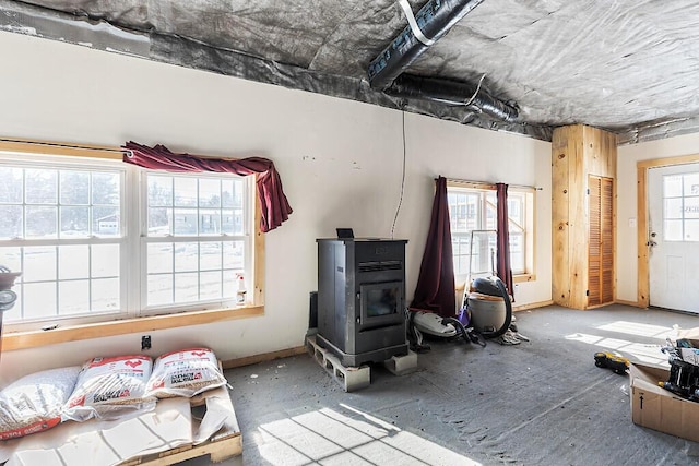 misc room featuring a wood stove