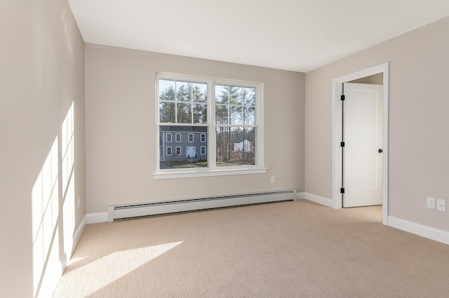 LOT9 Westhaven Ln, Wells, ME 04090 - spare room with a baseboard heating unit, baseboards, and carpet flooring