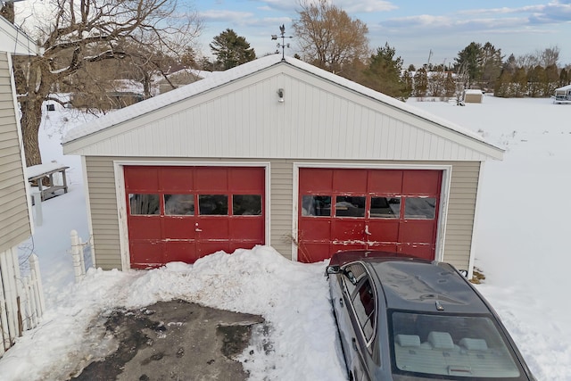 view of snow covered garage