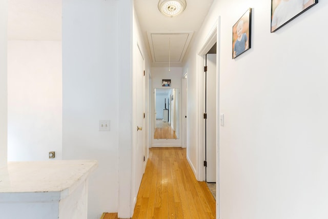 corridor featuring light wood-type flooring