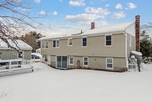 view of snow covered property