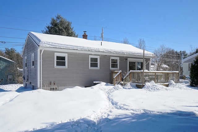 view of front of home featuring a wooden deck