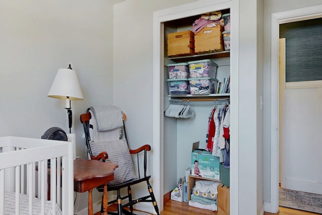 bedroom featuring a closet and wood finished floors