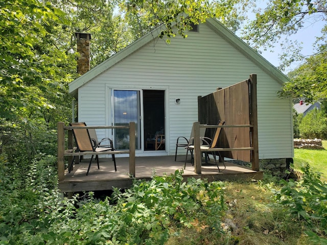 rear view of house with a deck