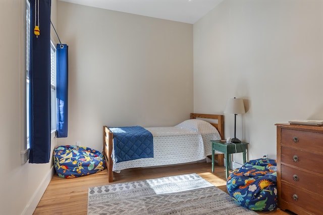 bedroom featuring hardwood / wood-style floors